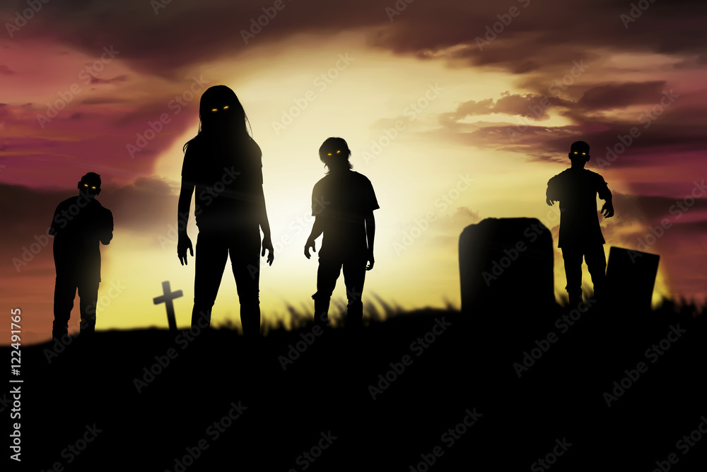 Obraz premium Silhouette some zombies on the cemetery walking around