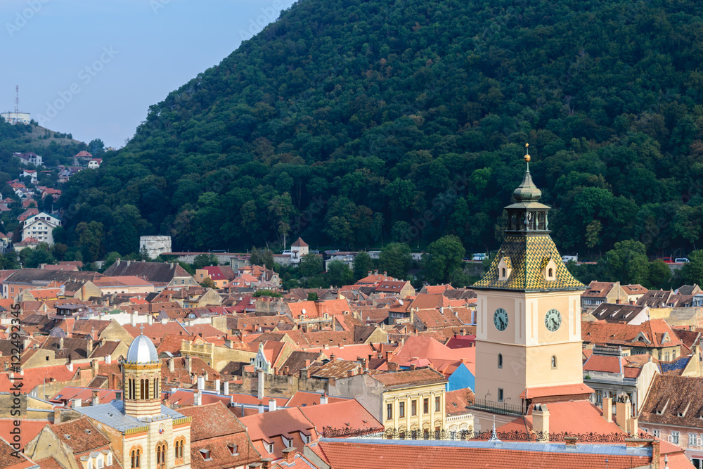 Clock tower and roof tiles in Brasov, Transylvania, Romania
