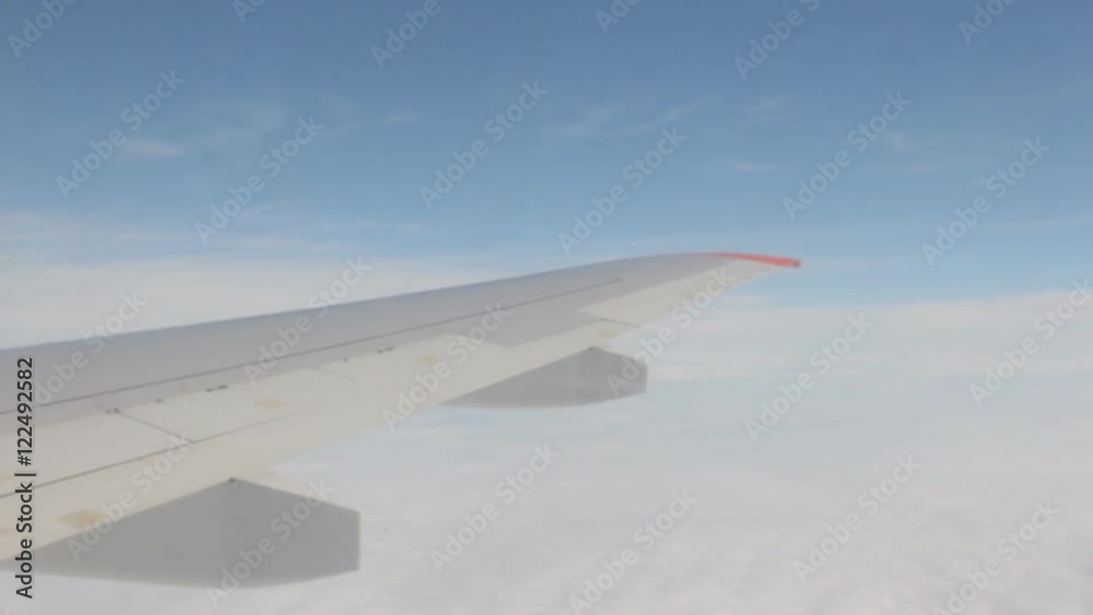 A nice view of the airplane wing from the airplane window. A nice view of the airplane wing from the airplane window.