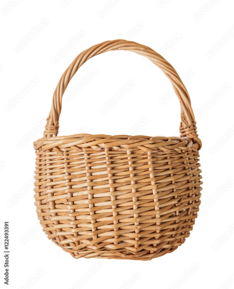 Fototapeta premium Wicker basket on a white background