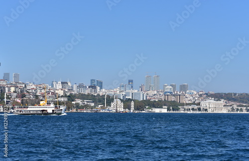 View of the Dolmabahce Mosque, clock tower and Dolmabahc Palace from Bopshorus © akturer