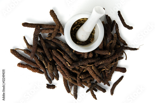 Long pepper or Pipli or Dipli (Piper longum) isolated on white b photo