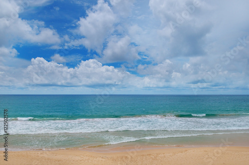 ocean  sandy beach and blue sky