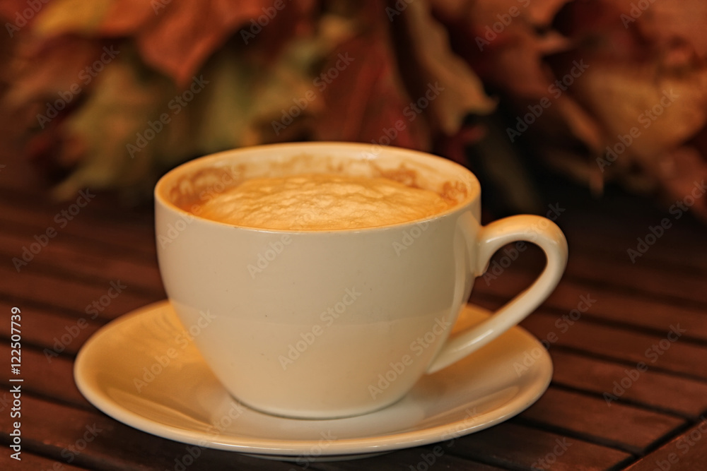 cup of coffee cappuccino on wooden table . Soft focus vintage picture cup of coffee cappuccino on wooden table . Soft focus vintage picture