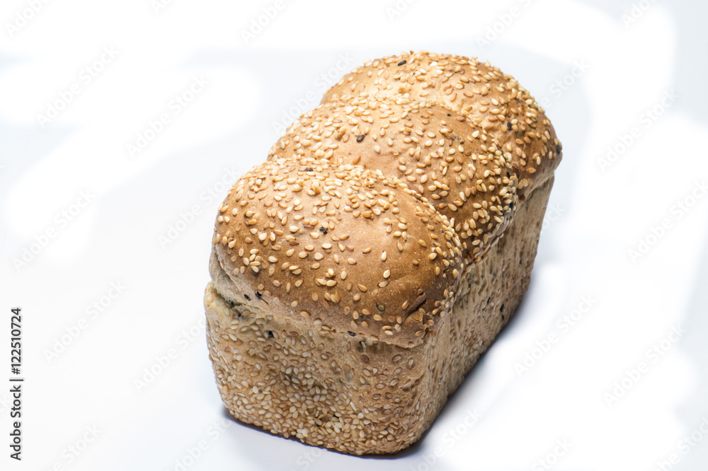 whole wheat breads isolated on a white background. whole wheat breads isolated on a white background.