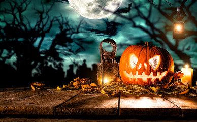 Scary halloween pumpkin on wooden planks