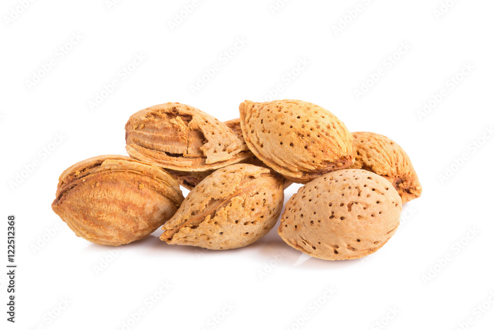 Almond nut in shell and shelled isolated on white background Almond nut in shell and shelled isolated on white background