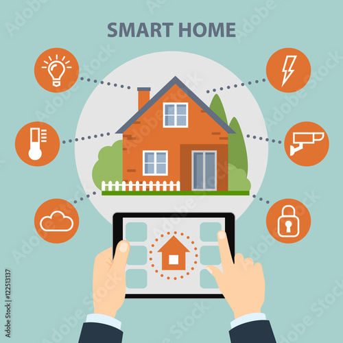 Smart home concept. Hands hold tablet and control home system as energy, conditioning, temperature and more. Wireless system.