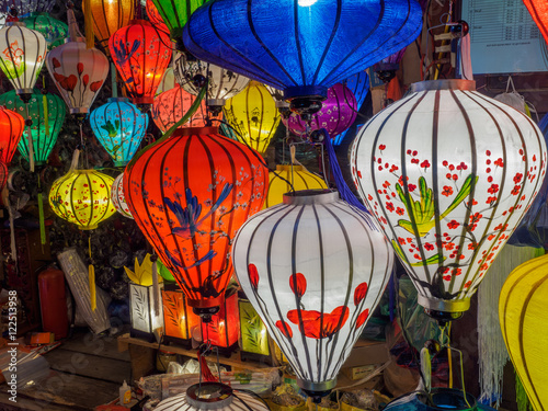 Handcrafted lamps in night market in Hoi an, Vietnam photo