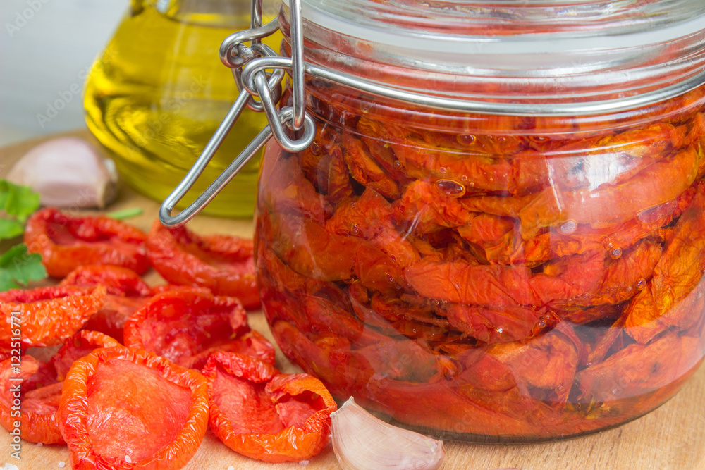homemade dried tomatoes in glass jar homemade dried tomatoes in glass jar