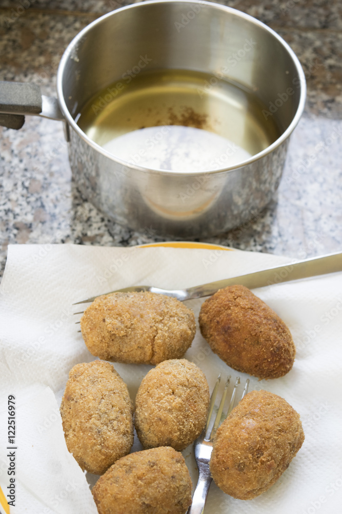 rice balls fried in pan with olive oil rice balls fried in pan with olive oil