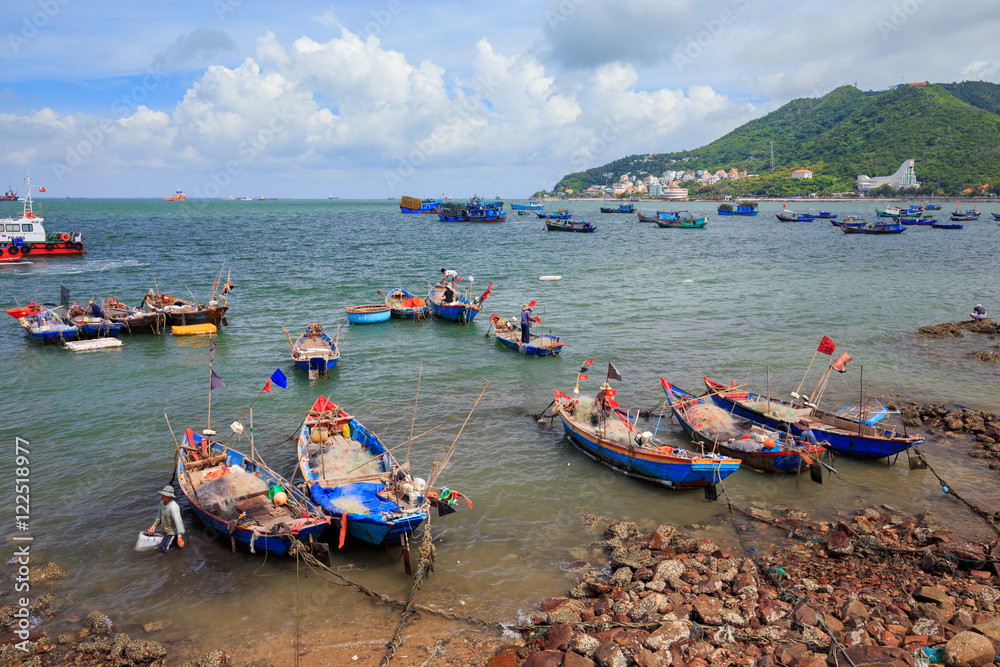 Different and colorful fishing boats in Vung Tau.