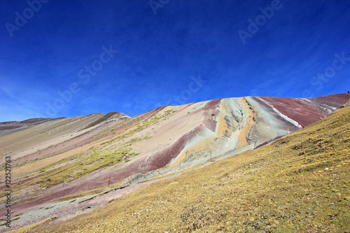 Along the hike up to the Rainbow Mountain near Cusco Peru. Not less colorful. Located about 20km south of Ausangate mountain.