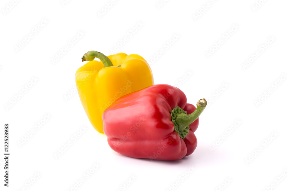 Red and yellow sweet peppers isolated on white background Red and yellow sweet peppers isolated on white background