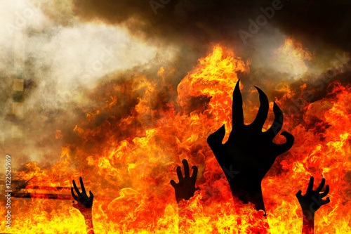 Fotografia, Obraz Hand of Ghost with burning fire. Halloween holidays art design,