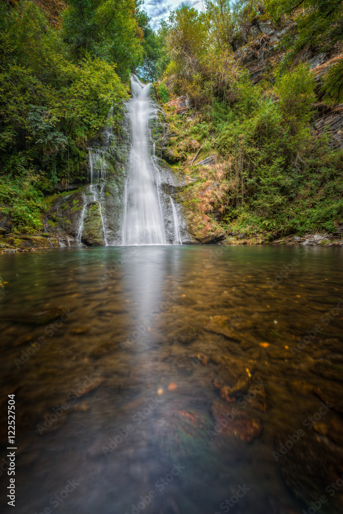 Fototapeta premium A cascade and its reflection in the river