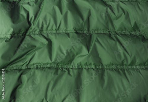 A full page of bright green sleeping bag background texture