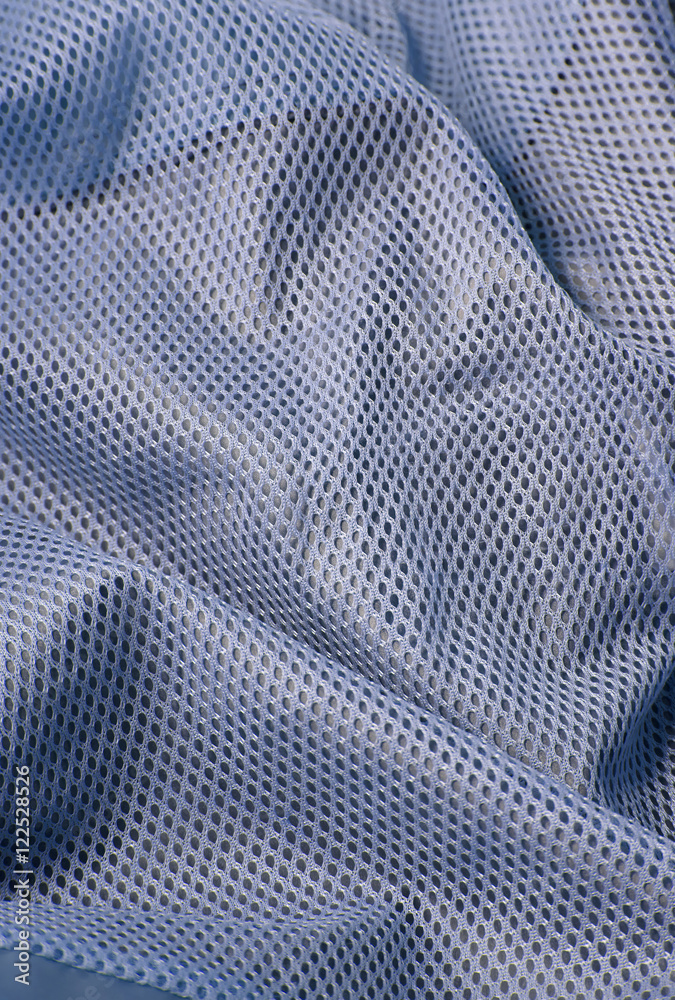 A full page of blue netting fabric background texture Stock Photo