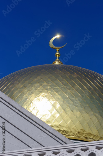 Gilded dome and crescent moon Muslim mosque