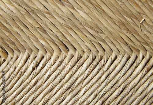 A full page of woven reed chair background texture