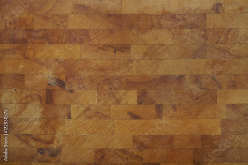 A full crop of olive wooden chopping board background texture