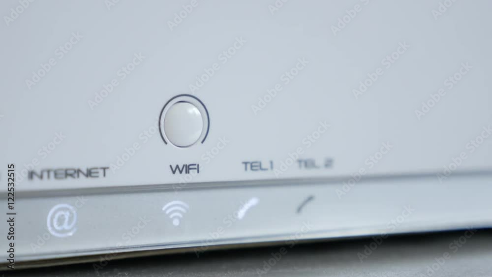 Turning ON Wi-Fi signal on white Internet router 4K 2160p 30fps UltraHD footage - Hand finger pressing wireless device wireless button 3840X2160 UHD video Turning ON Wi-Fi signal on white Internet router 4K 2160p 30fps UltraHD footage - Hand finger pressing wireless device wireless button 3840X2160 UHD video