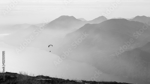 Paraglider in action, bw
