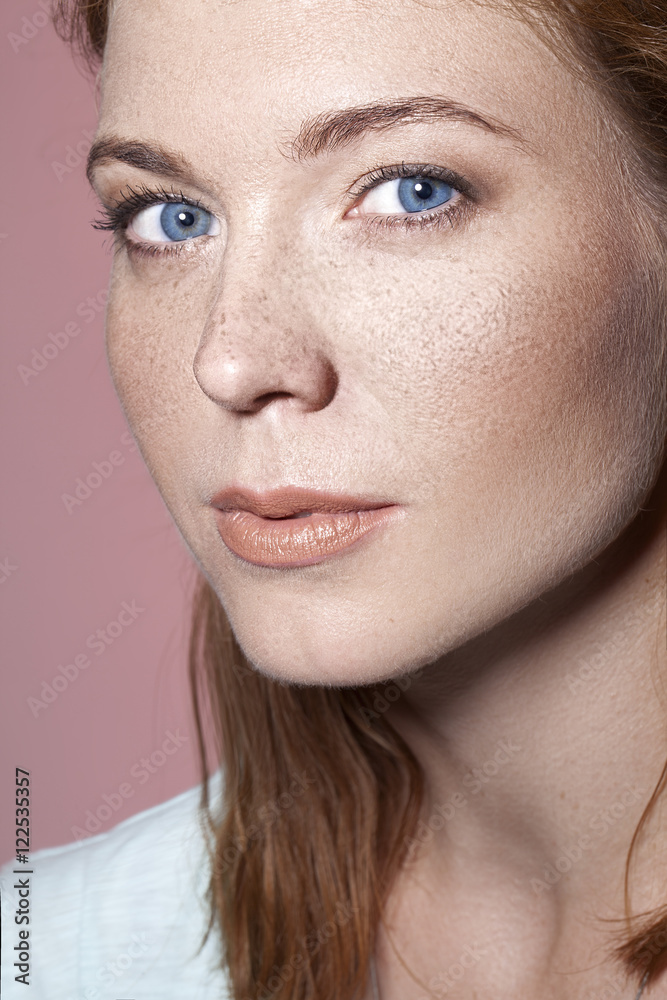 pretty red haired girl with blue eyes and
freckles close up portrait pretty red haired girl with blue eyes and
freckles close up portrait