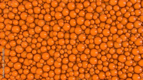 A mass of orange balls. 3D rendering. Abstract background.