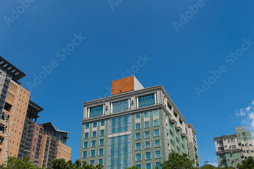 Office building in the city under blue sky