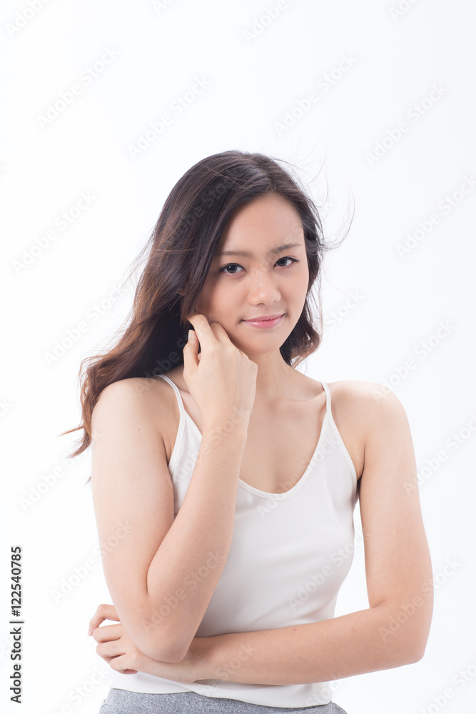 An Asian teenage girl with nice skin and light make-up smiling showing pretty face An Asian teenage girl with nice skin and light make-up smiling showing pretty face