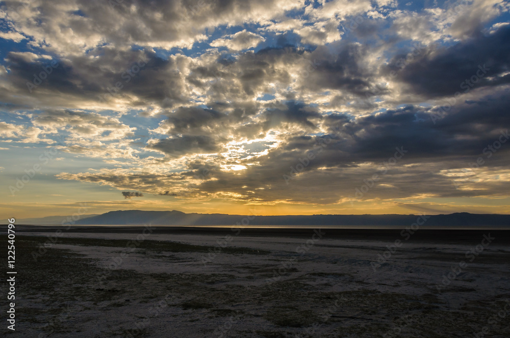 Fototapeta premium Clouds at sunset at Lake Eyasi, Tanzania