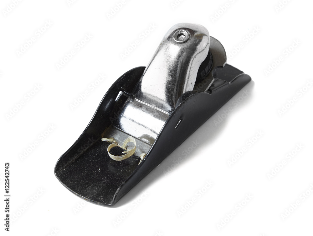 A metal hand plane for wood work, isolated on a white background A metal hand plane for wood work, isolated on a white background