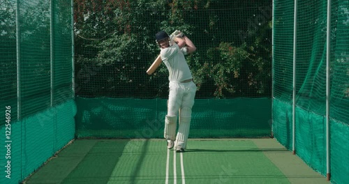 Cricketer in nets. photo