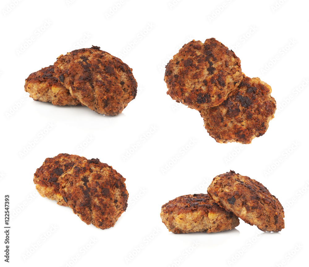 Couple of small hand made cutlets isolated over white background Couple of small hand made cutlets isolated over white background
