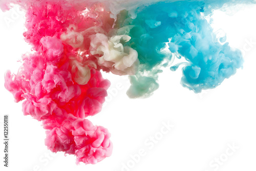 Color ink paint in water, photographed motion, isolated on white.