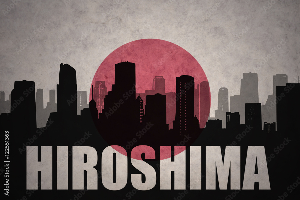 abstract silhouette of the city with text Hiroshima at the vintage japanese flag background