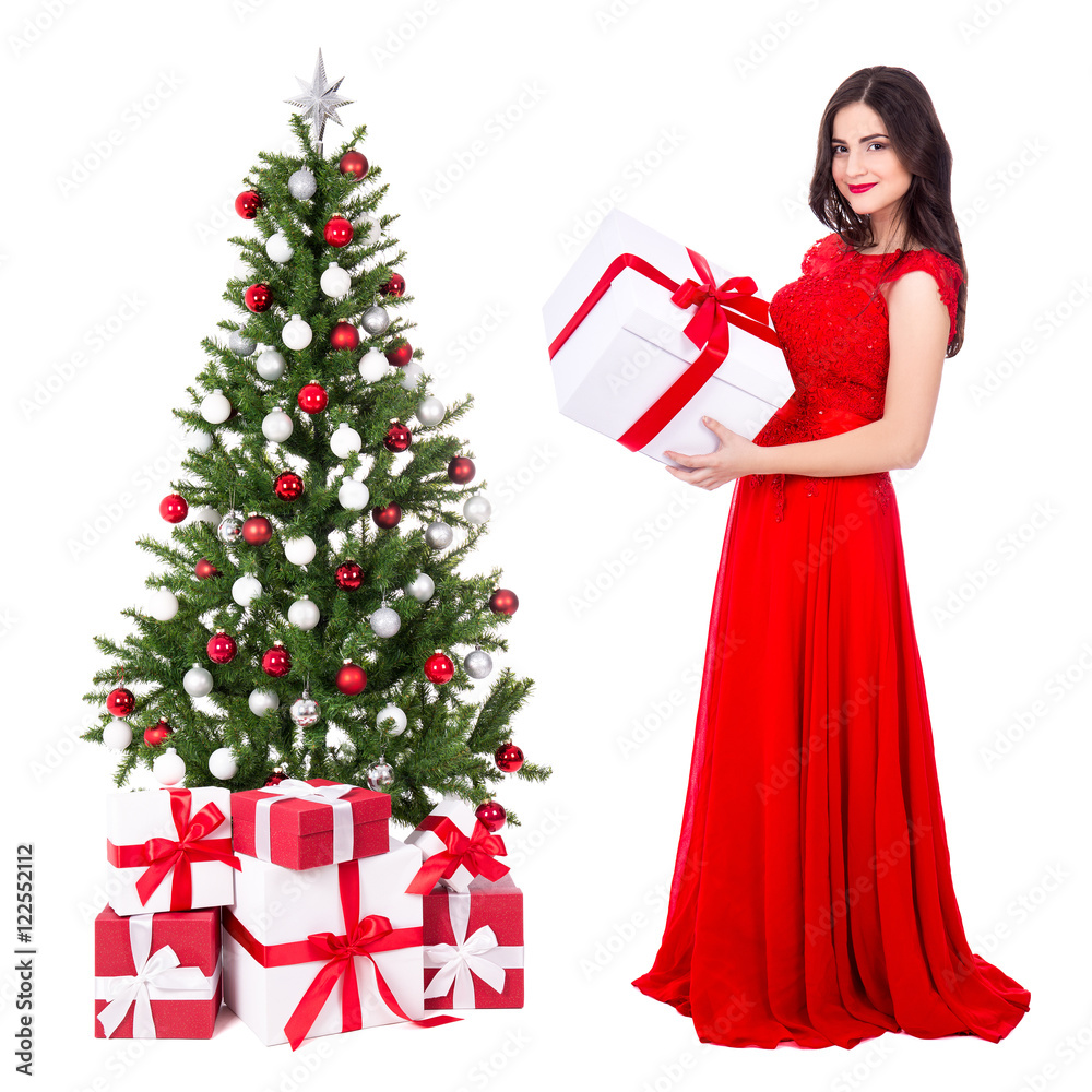 young beautiful woman in red dress with big gift box and decorat young beautiful woman in red dress with big gift box and decorat