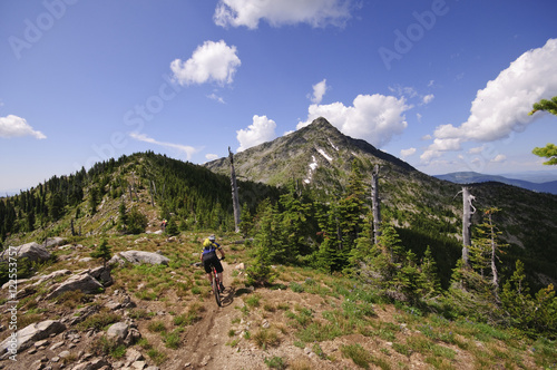 Mountain biking along the Seven Summits trail in Rossland. Kootenay Rockies region, British Columbia, Canada