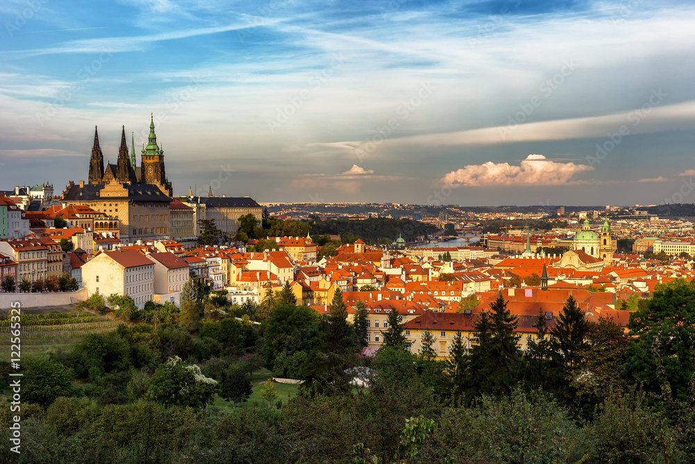 Prague, Czech Republic skyline panorama. St. Vitus Cathedral over old town red roofs