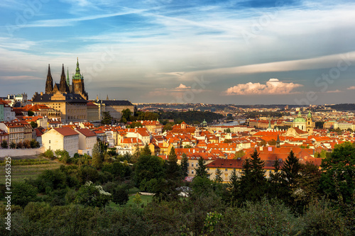 Prague, Czech Republic skyline panorama. St. Vitus Cathedral over old town red roofs