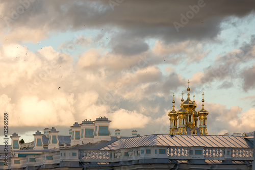 Golden dome of Catherine Palace and gloomy sky