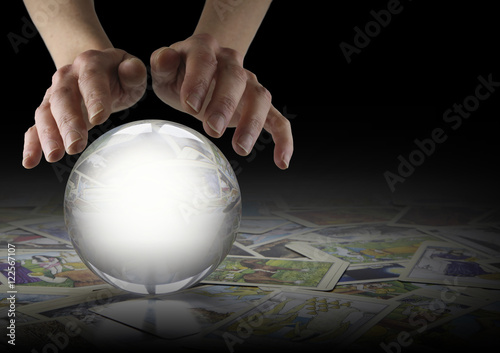 Wall Mural Crystal Ball Reading and Tarot Cards - Hands hovering over a large clear Crystal