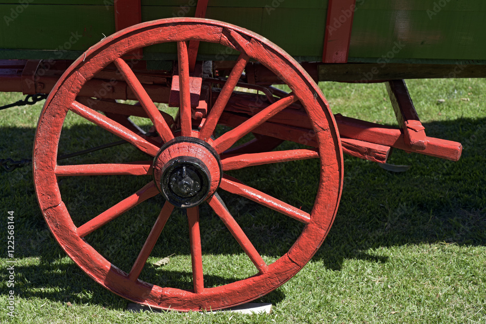 Red wheel of ancient wagon