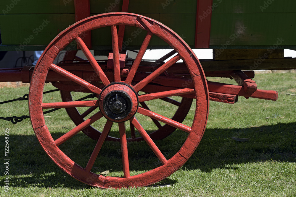 Red wheel of ancient wagon