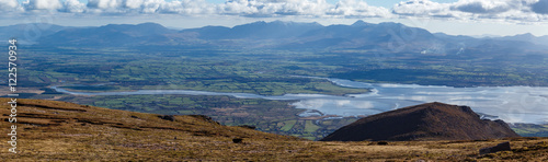 View of Castlemaine harbour and MacGillycuddy Reeks from Sliabh Mish mountains on the Dingle Peninsula, County Kerry, Ireland photo