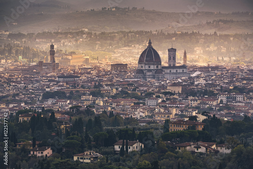 Florence aerial foggy cityscape. Panorama view from Fiesole hill photo