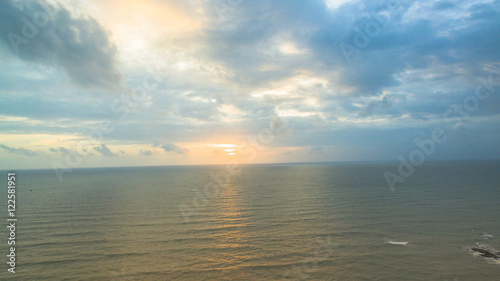 aerial view above light house tower in sunset time.light house was build on the rock near Nang Thong beach Khaolak Phang Nga province