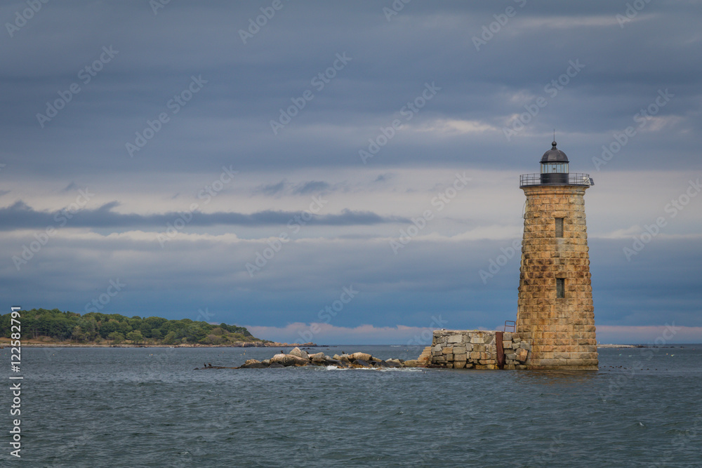 Whaleback Lighthouse in Kittery, Maine, on a cloudy foggy day in early Fall