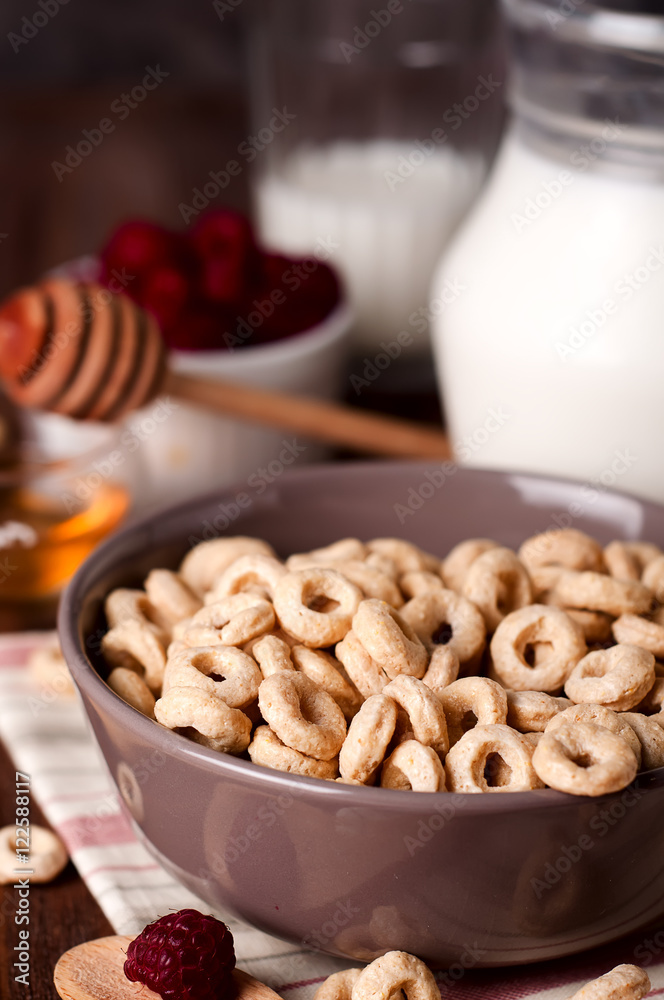 Healthy breakfast - cereal rings in a bowl with milk Healthy breakfast - cereal rings in a bowl with milk